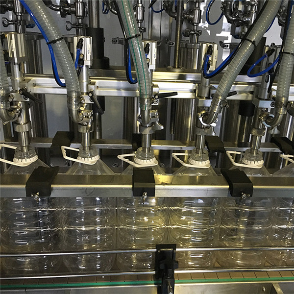 màquina de omplir oli